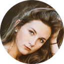 Young girl touching her hair