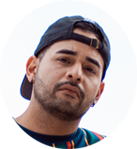 Young bearded man with a blue hat